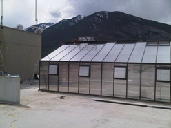 Sliding the roof vents into place on May 18.